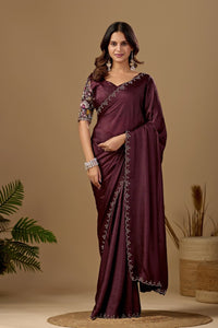Woman wearing a coffee brown Tesla saree with floral embroidered blouse and border — Chandrikas