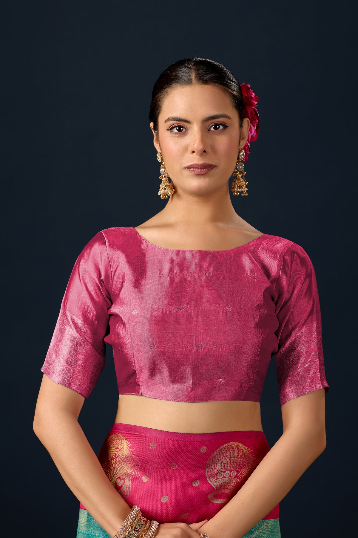 Woman in close pose wearing emerald green maroon silk matka motif border saree — Chandrikas