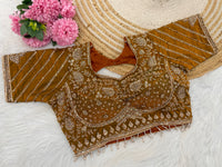 Golden yellow sequin embroidered designer blouse flatlay showing sleeve detail ā Chandrikas