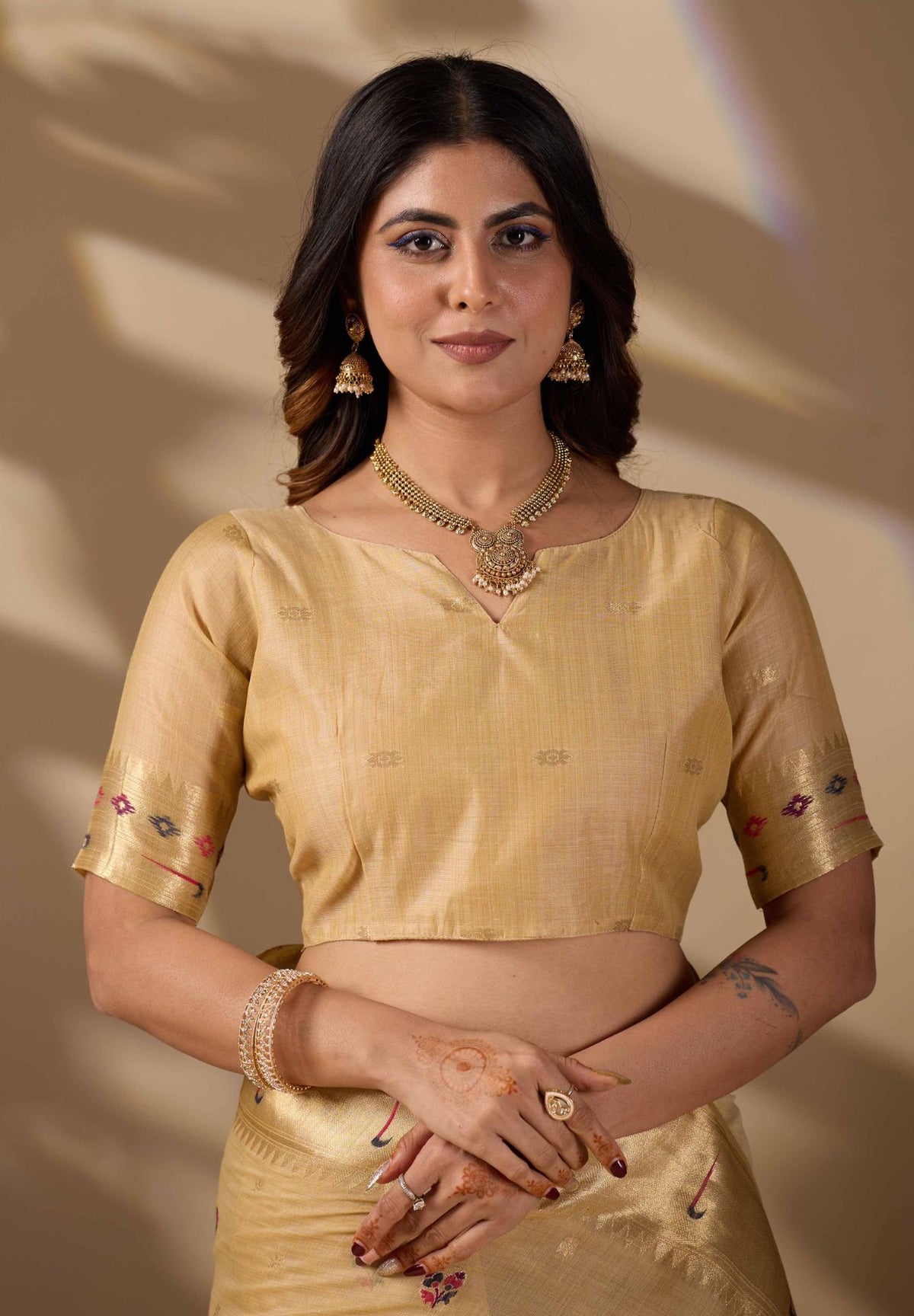 Woman in close pose wearing mustard yellow Banarasi-Paithani zari pallu cotton saree — Chandrikas