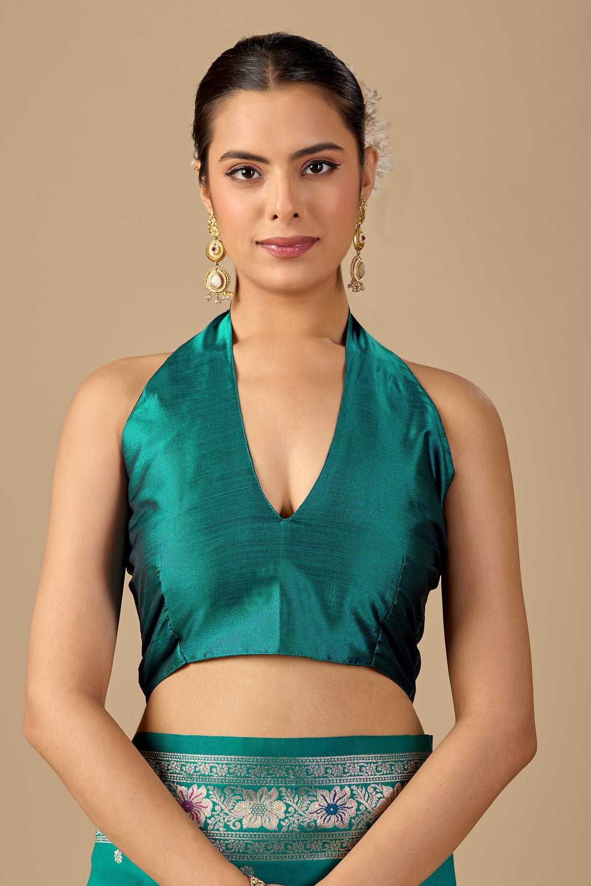 Woman in close pose wearing sea green Meenakari deer motif zari pallu silk saree — Chandrikas