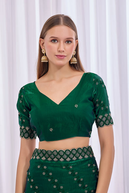 Model wearing Bottle Green satin floral thread work designer border saree with embroidered blouse front view — Chandrikas