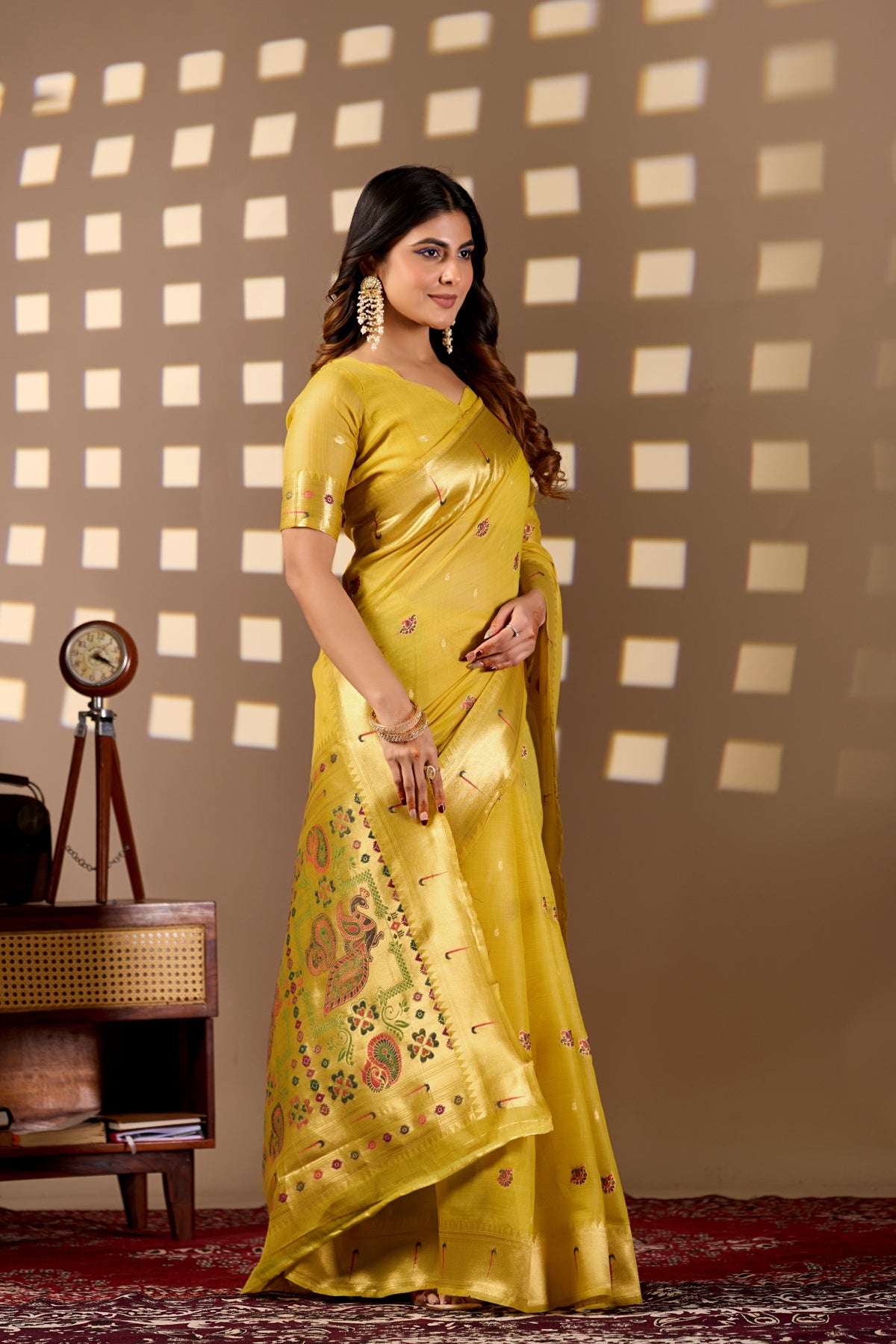 Woman in standing pose wearing bright yellow Banarasi-Paithani Meenakari cotton saree — Chandrikas