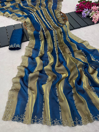 Closeup of cobalt blue striped satin patta saree flatlay showing golden border detail — Chandrikas