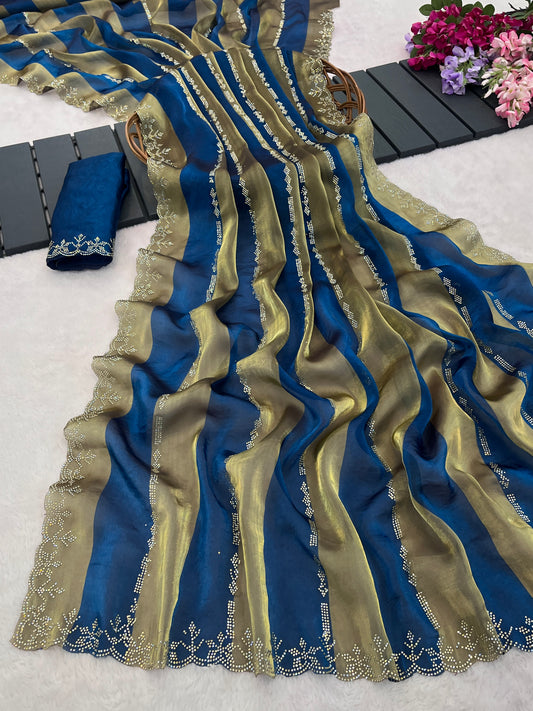 Closeup of cobalt blue striped satin patta saree flatlay showing golden border detail — Chandrikas