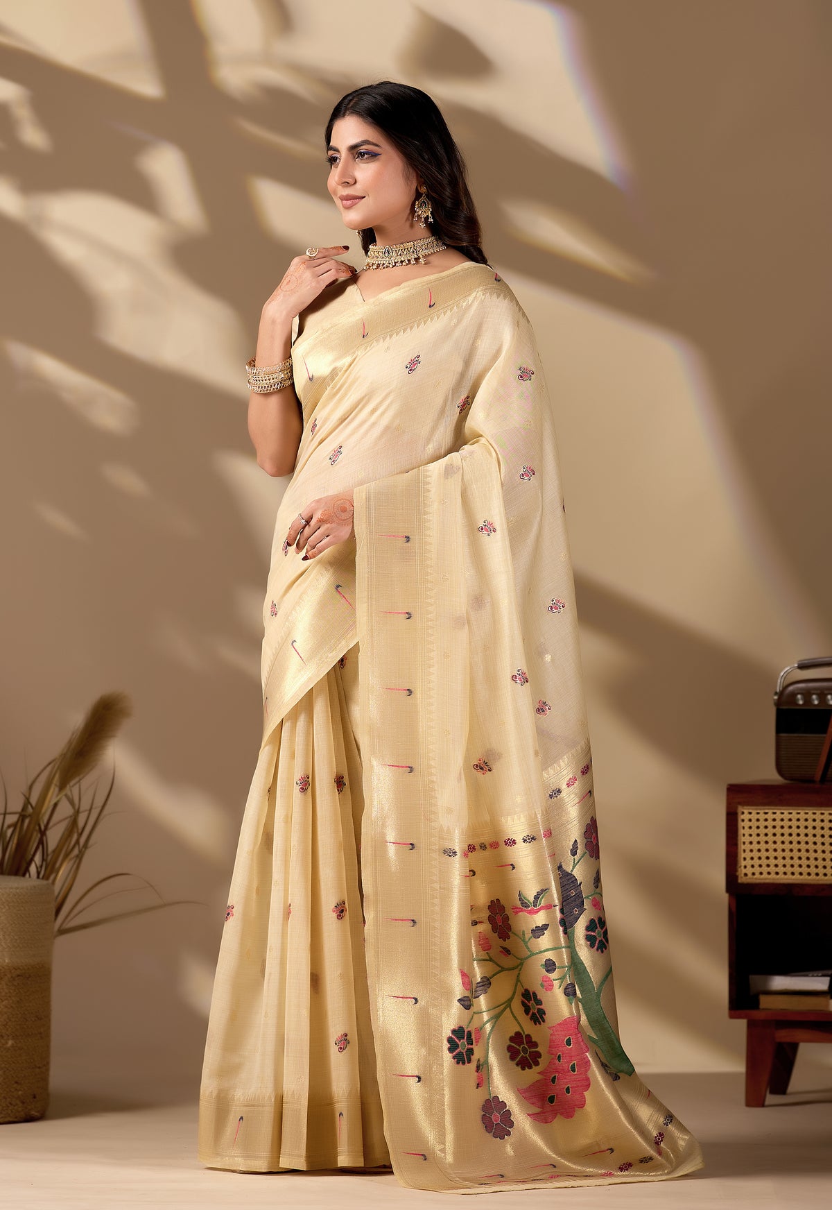Woman in standing pose wearing cream beige Banarasi-Paithani fusion cotton saree — Chandrikas
