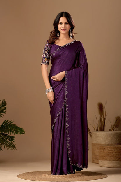 Woman wearing a deep purple Tesla saree with floral embroidered blouse and border — Chandrikas