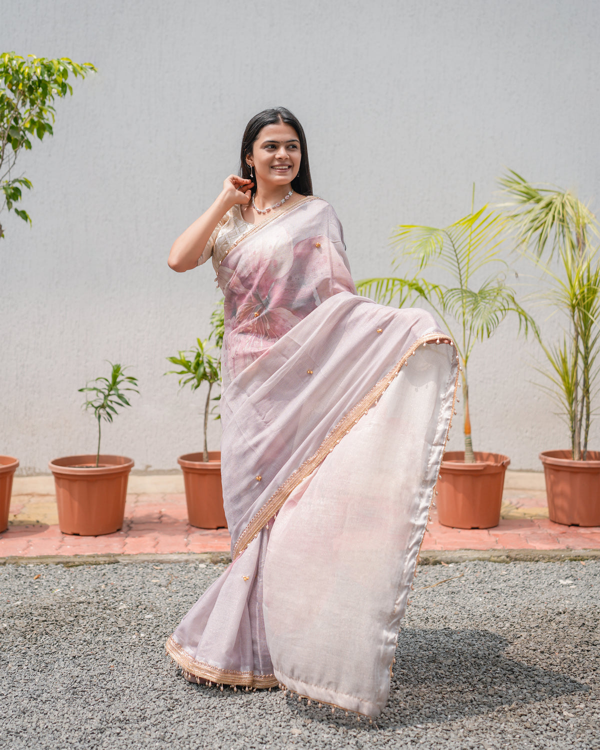 Woman in front pose wearing dusty lavender pink floral digital print tissue cotton zari saree — Chandrikas