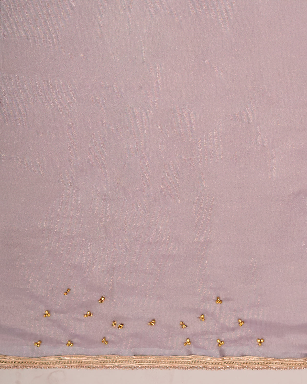 Flat view of dusty lavender tissue cotton matching blouse piece with ghungroo detailing and zari border — Chandrikas
