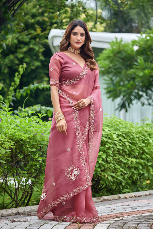 Woman in standing pose wearing dusty pink sequin floral embroidered tissue silk saree with border — Chandrikas