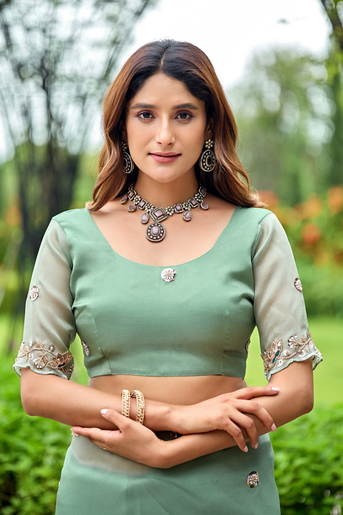 Close up of dusty rama sequin floral embroidered tissue silk saree with matching blouse — Chandrikas