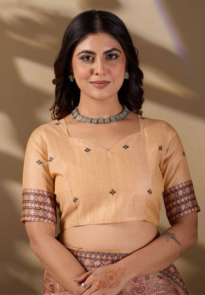 Woman in close pose wearing dusty rose Banarasi cotton jacquard jaal saree — Chandrikas