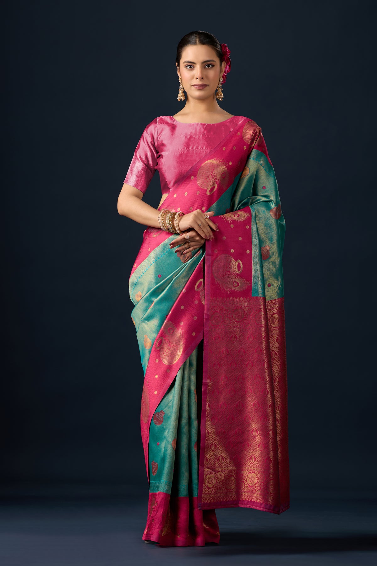 Woman in front pose wearing emerald green maroon silk matka motif border saree — Chandrikas