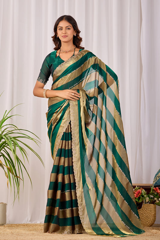 Woman in front pose wearing emerald green striped satin patta saree with golden border — Chandrikas