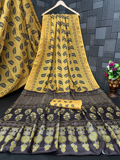 Golden mustard leaf print cotton saree flatlay with brown border and matching blouse — Chandrikas