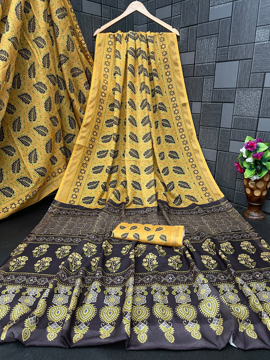 Golden mustard leaf print cotton saree flatlay with brown border and matching blouse — Chandrikas