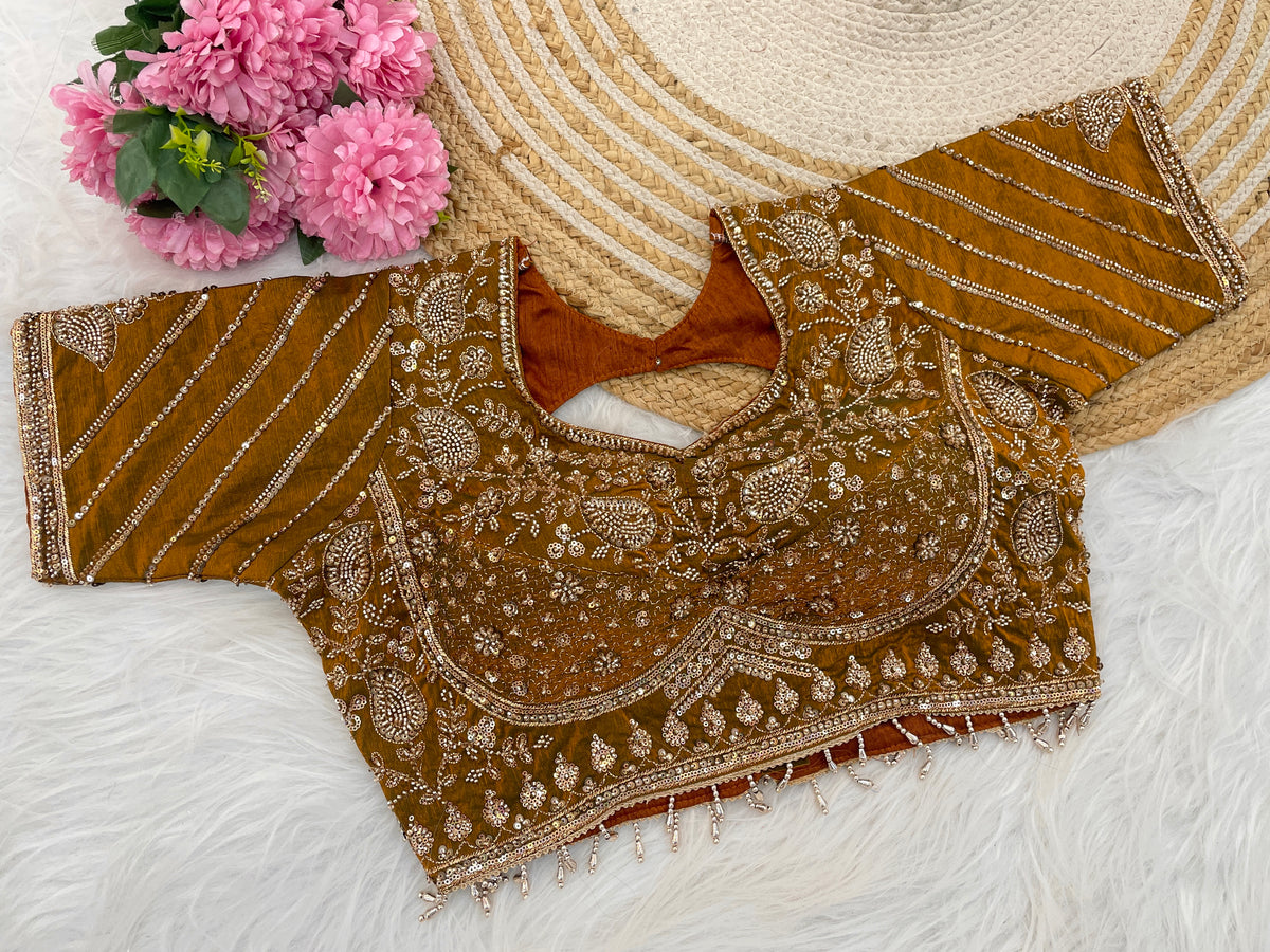Golden yellow sequin embroidered designer blouse flatlay showing sleeve detail — Chandrikas