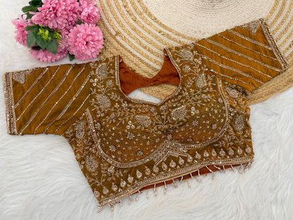 Golden yellow sequin embroidered designer blouse flatlay showing sleeve detail — Chandrikas