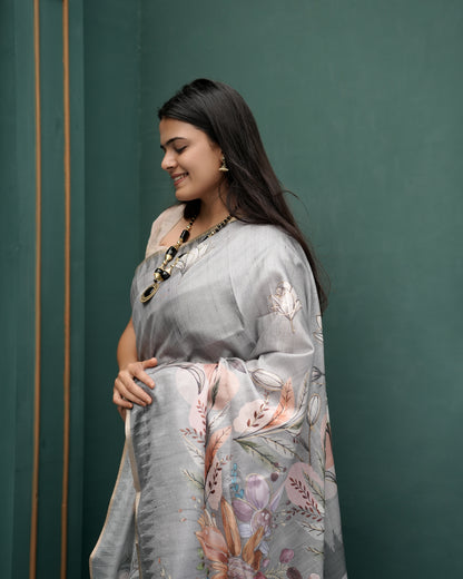 Woman in profile pose wearing grey woven lotus floral digital print cotton saree — Chandrikas