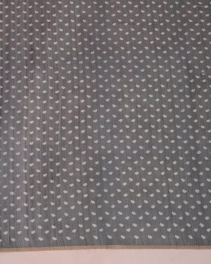 Close-up of grey cotton saree showing woven lotus floral buttis pattern — Chandrikas