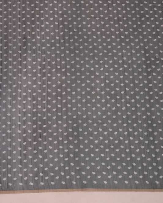 Close-up of grey cotton saree showing woven lotus floral buttis pattern — Chandrikas