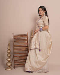 Woman in side pose wearing ivory cream floral jaal kundan work pure tissue saree — Chandrikas