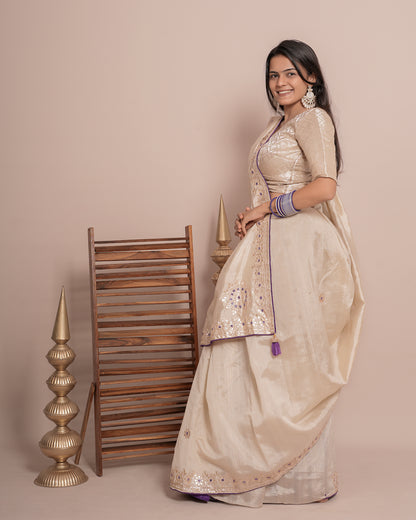 Woman in side pose wearing ivory cream floral jaal kundan work pure tissue saree — Chandrikas