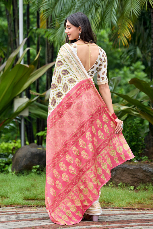 Woman in back pose wearing ivory cream leaf print cotton saree with pink border — Chandrikas