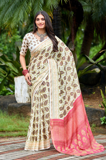 Woman in front pose wearing ivory cream leaf print cotton saree with pink border — Chandrikas