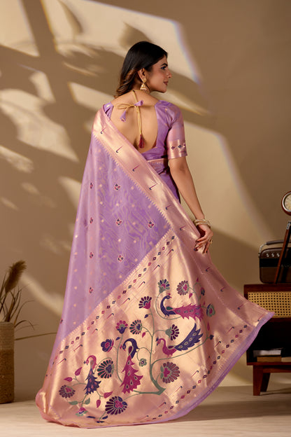 Woman draping lavender Banarasi-Paithani zari pallu cotton saree showing peacock motif — Chandrikas