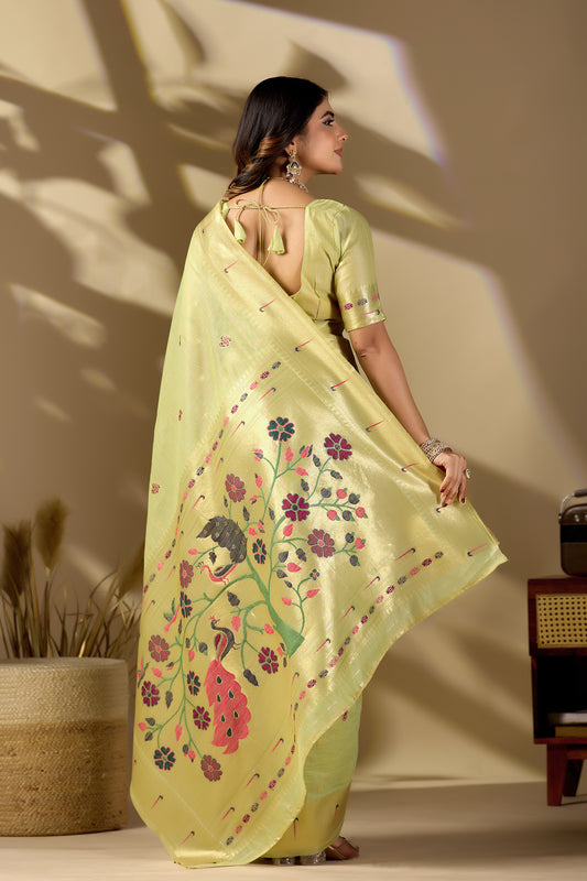 Woman in walking pose wearing lemon green Banarasi-Paithani fusion cotton saree — Chandrikas