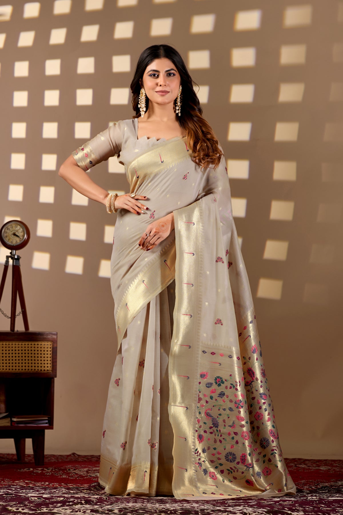 Woman in front pose wearing light beige Banarasi-Paithani Meenakari cotton zari pallu saree — Chandrikas