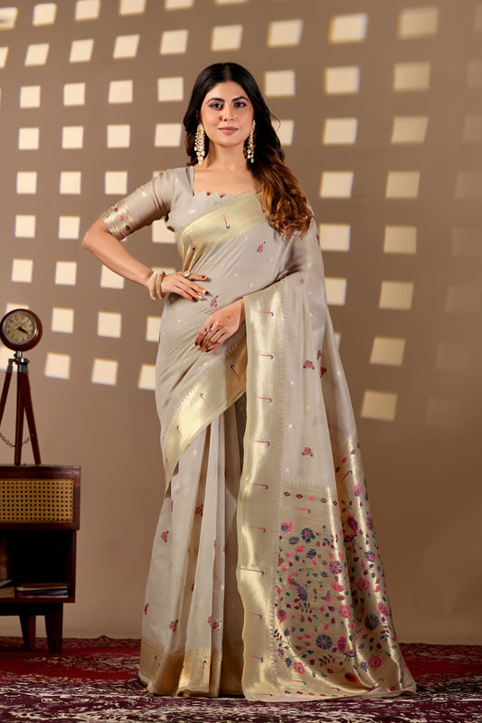 Woman in front pose wearing light beige Banarasi-Paithani Meenakari cotton zari pallu saree — Chandrikas
