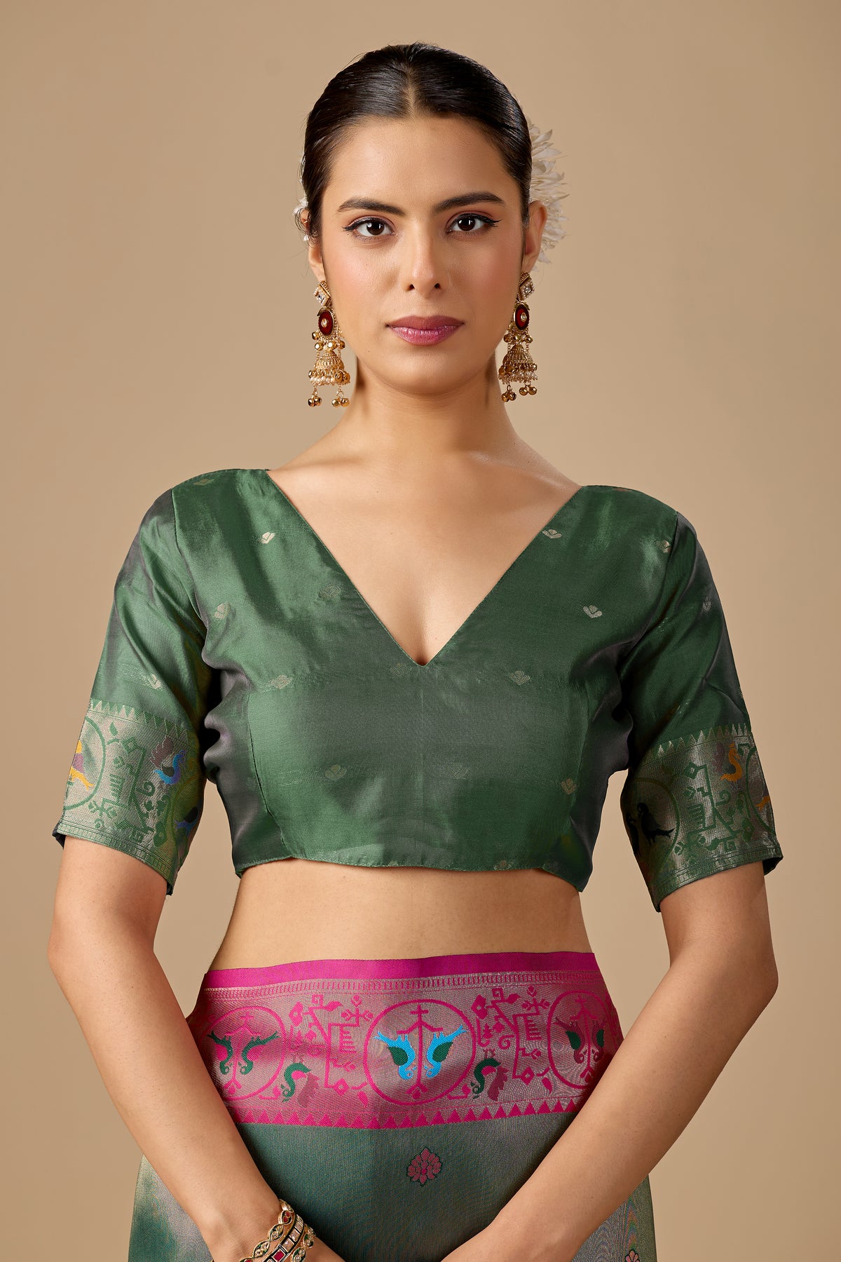 Woman in close pose wearing light olive green Paithani silk bird border pallu saree — Chandrikas