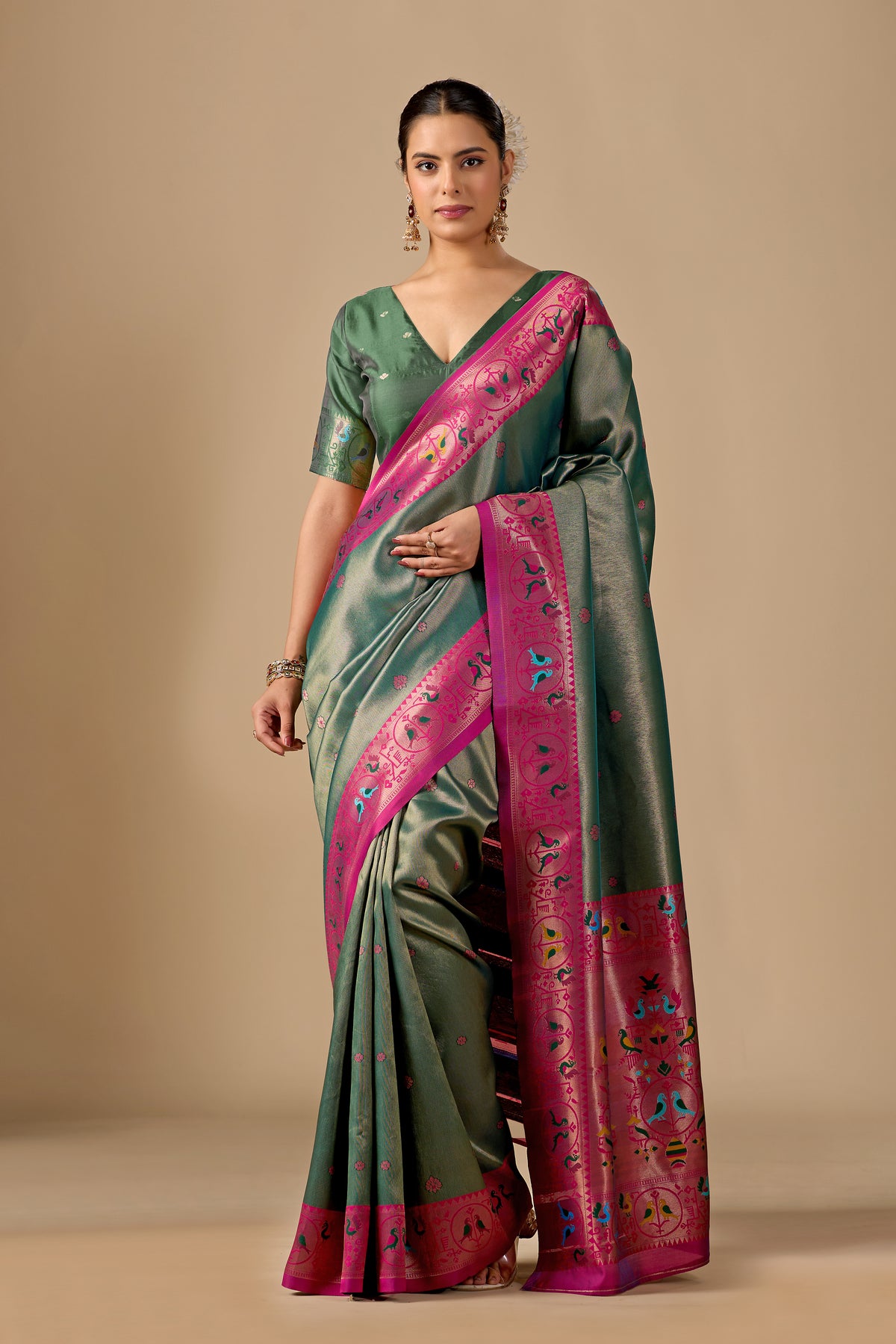 Woman in front pose wearing light olive green Paithani silk bird border pallu saree — Chandrikas