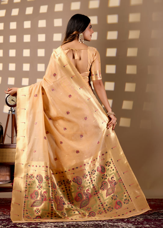Woman in back pose wearing light peach Banarasi-Paithani Meenakari cotton saree — Chandrikas