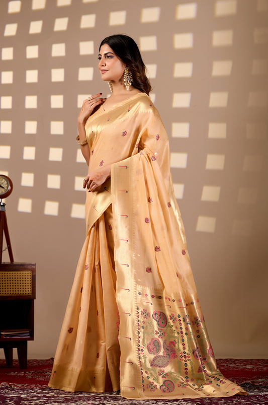 Woman in side pose wearing light peach Banarasi-Paithani Meenakari cotton saree — Chandrikas