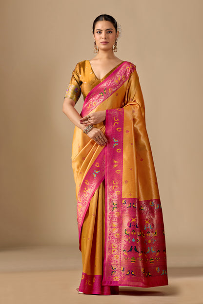 Woman in close pose wearing mango yellow Paithani silk bird border pallu saree — Chandrikas