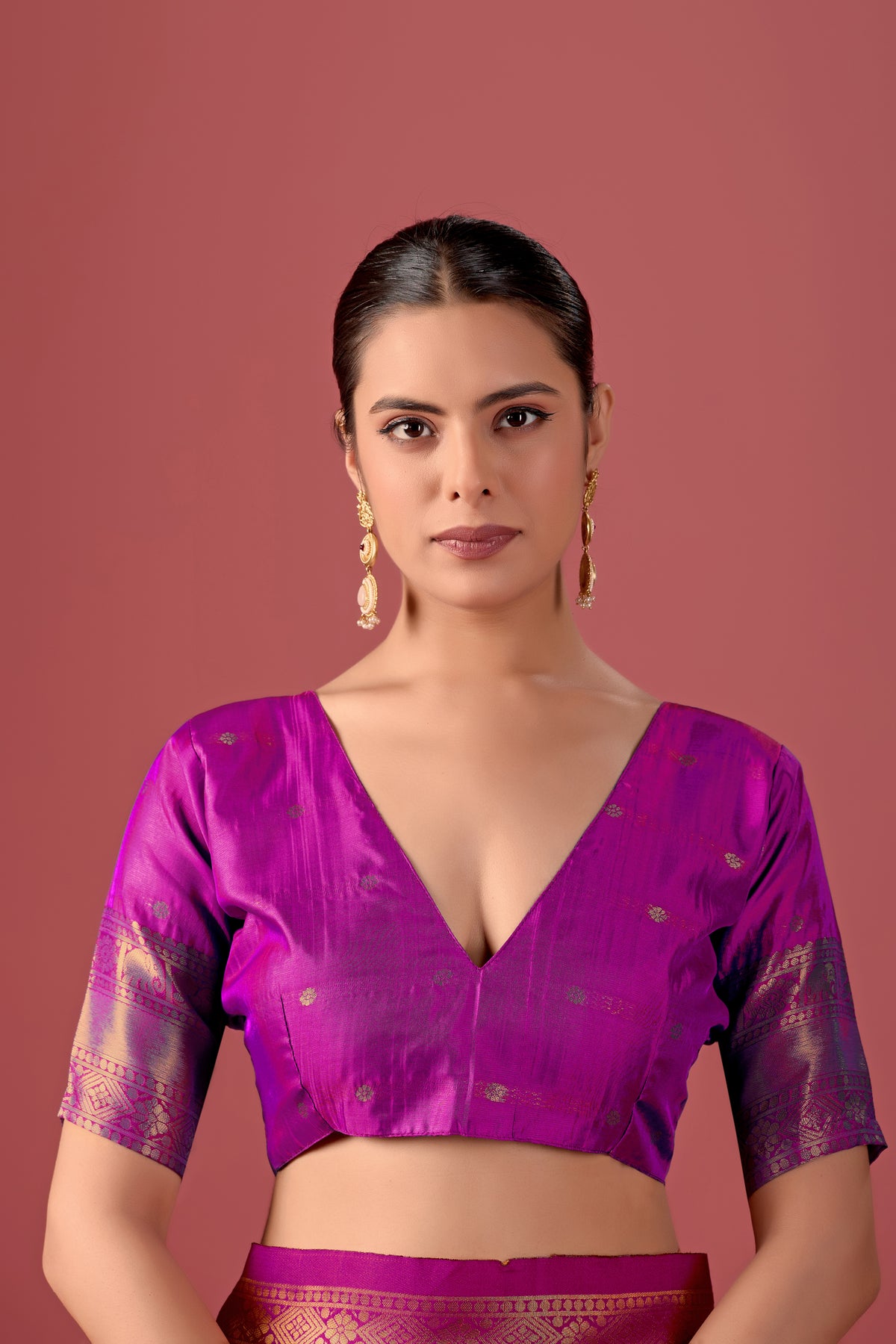 Woman in close pose wearing mango yellow pink Banarasi silk checks pattern saree — Chandrikas