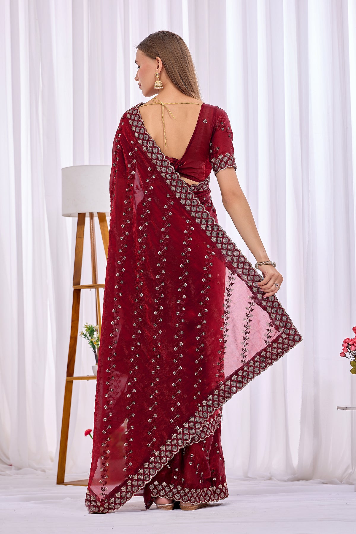 Back view of Maroon satin floral thread work designer border saree with pallu and blouse — Chandrikas
