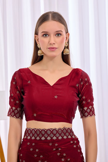 Model wearing Maroon satin floral thread work designer border saree with embroidered blouse front view — Chandrikas