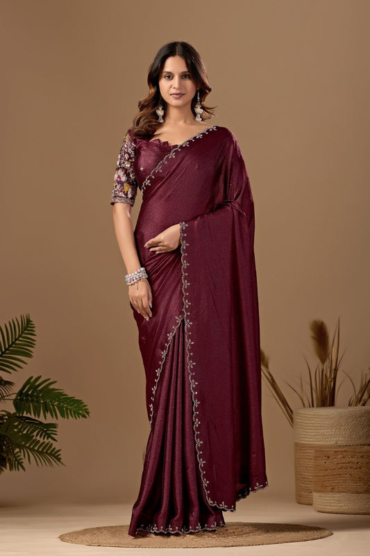 Woman wearing a maroon wine Tesla saree with floral embroidered blouse and border — Chandrikas