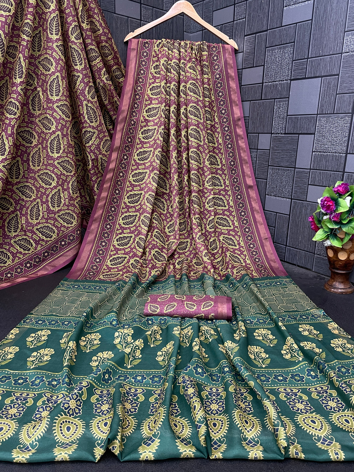 Mauve purple leaf print cotton saree flatlay with teal border and matching blouse — Chandrikas