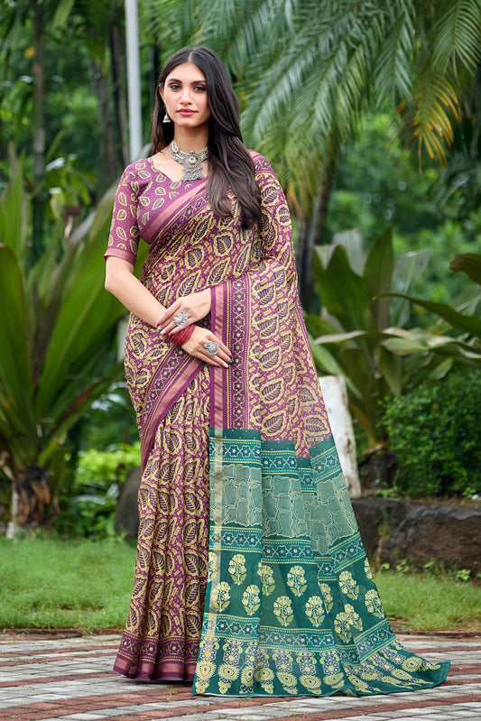 Woman in side pose wearing mauve purple leaf print cotton saree with teal border — Chandrikas