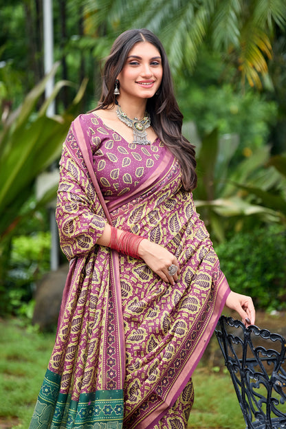 Woman in standing pose wearing mauve purple leaf print cotton saree with teal pallu — Chandrika