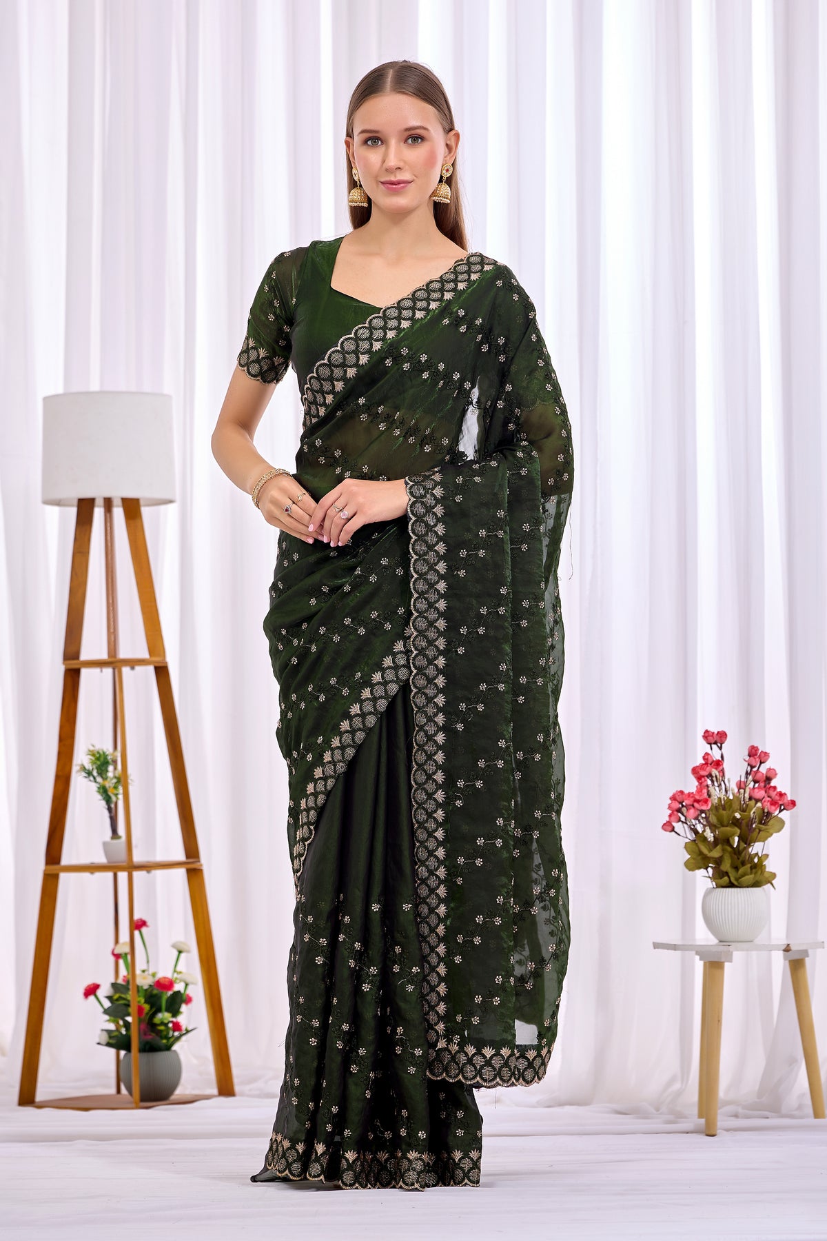 Full length front look of Mehendi Green satin floral thread work designer border saree draped on model — Chandrikas