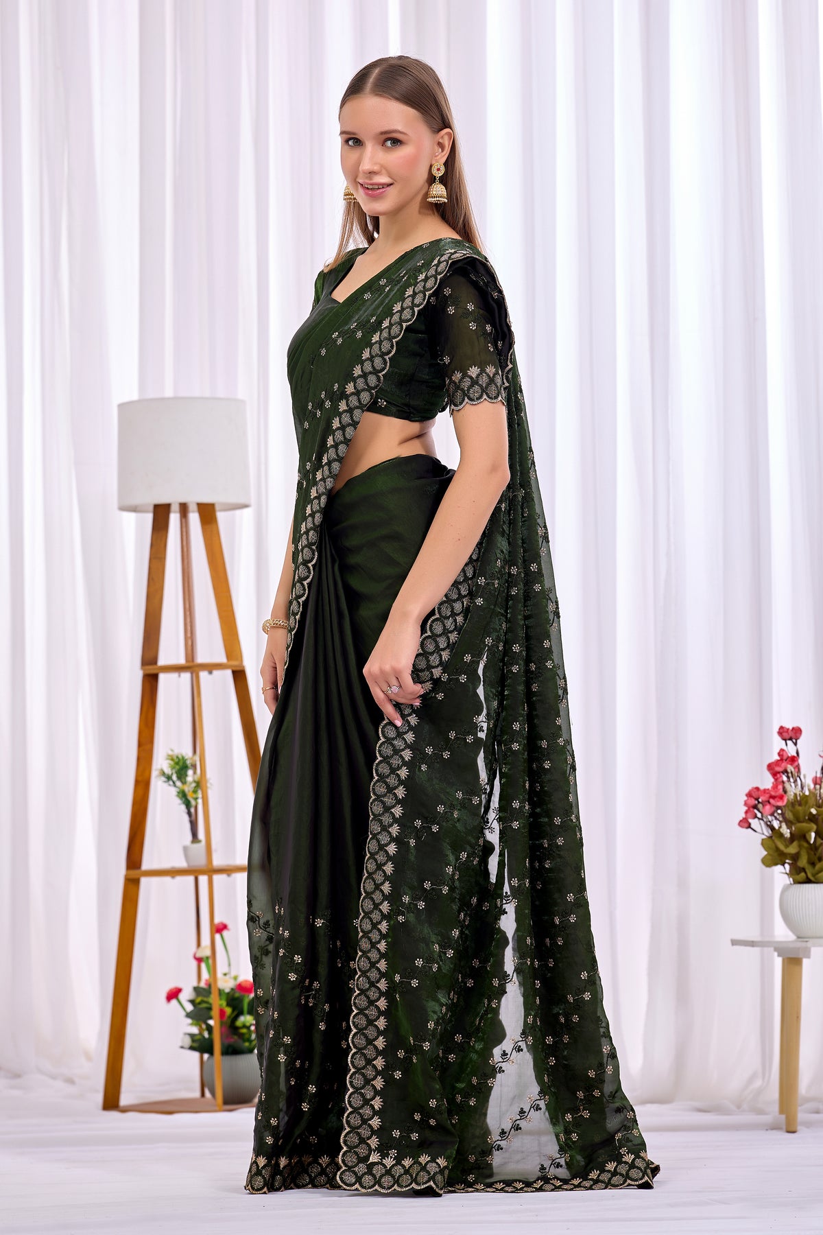 Pallu drape detail of Mehendi Green satin floral thread work designer border saree with all-over embroidery — Chandrikas