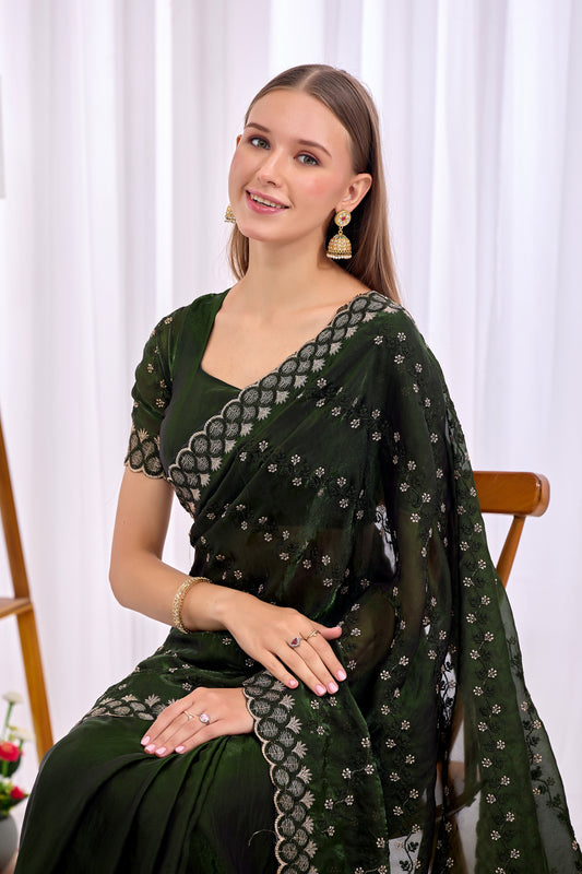 Stylish pose in Mehendi Green satin floral thread work designer border saree showing embellished border — Chandrikas