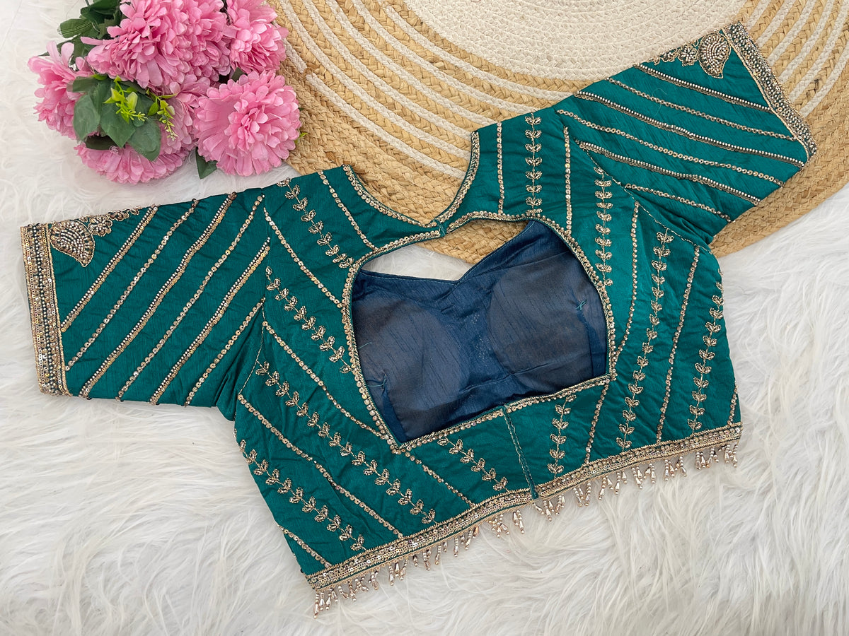 Metallic rama teal green sequin embroidered blouse flatlay neckline — Chandrikas