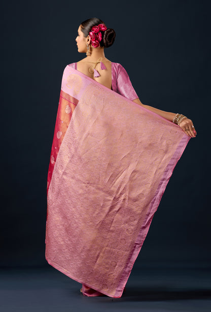 Woman draping metallic rust pink silk matka motif border saree showing pallu design — Chandrikas